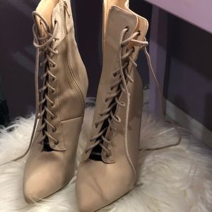 Beige booties with lace up ties